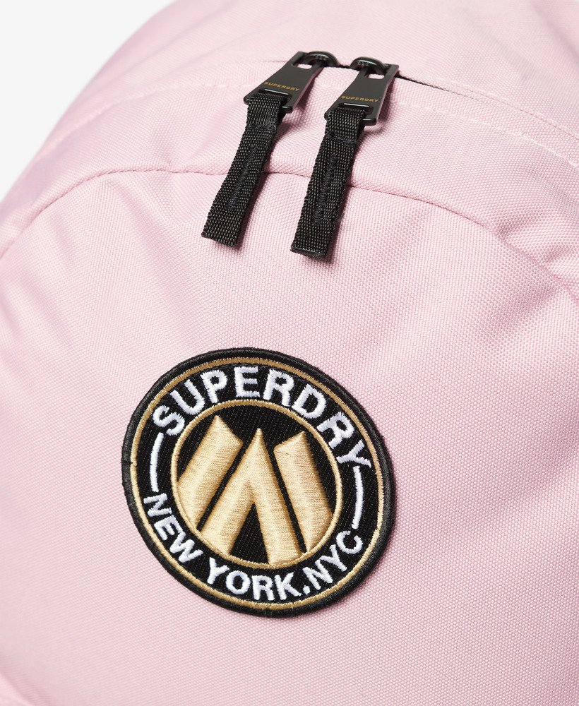mochila city montana na cor rosa claro