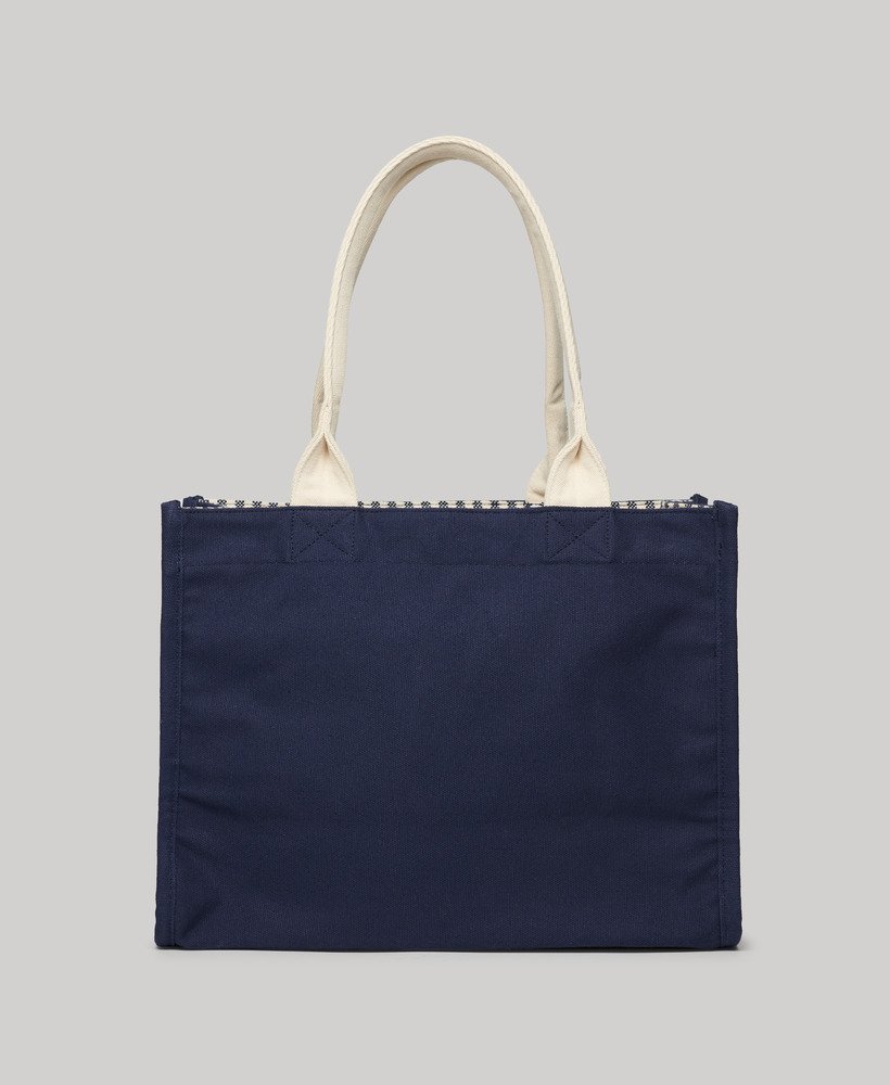 bolsa tote de luxo na cor azul marinho puro.