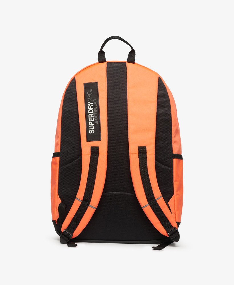 mochila nyc montana na cor coral vulcânico