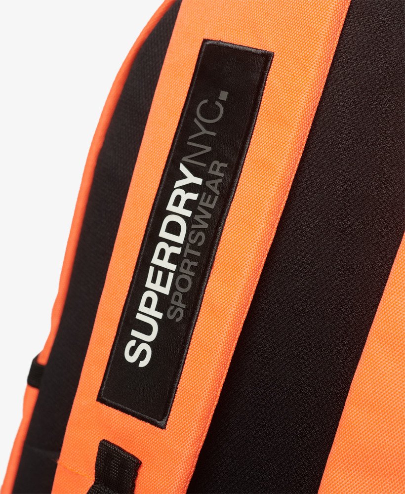 mochila nyc montana na cor coral vulcânico