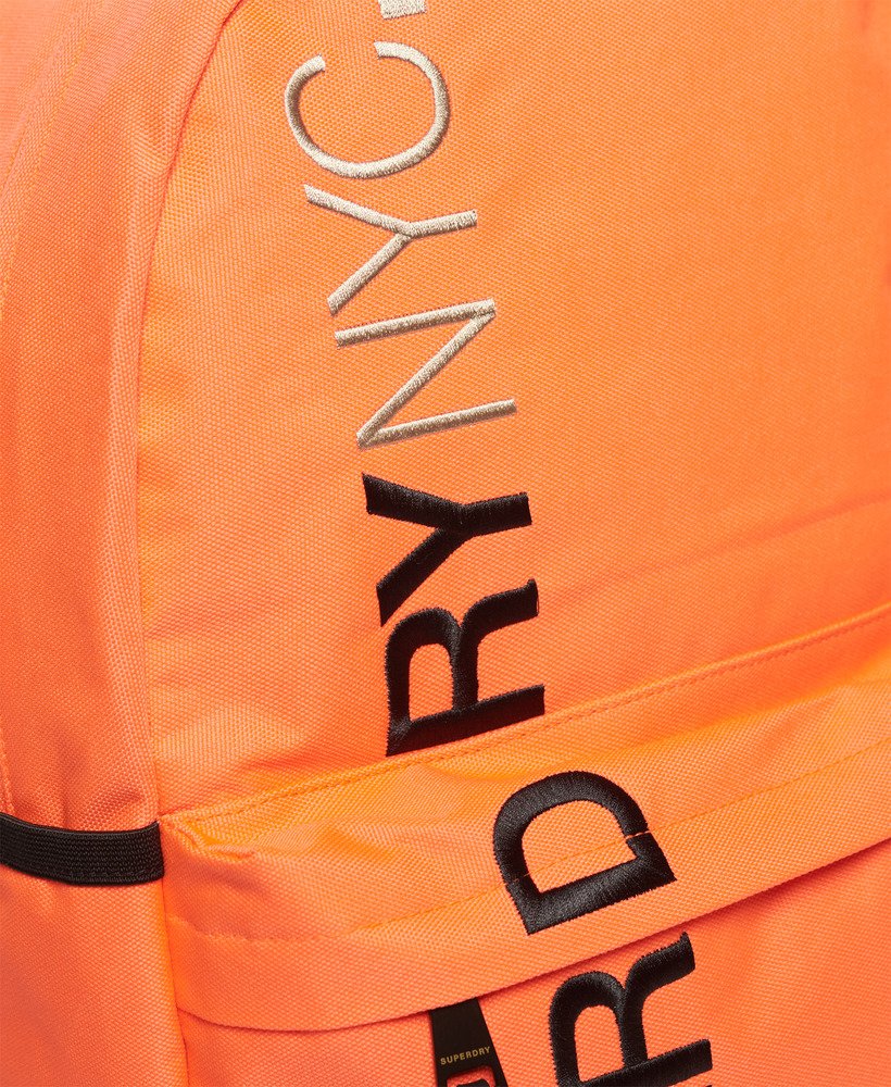 mochila nyc montana na cor coral vulcânico
