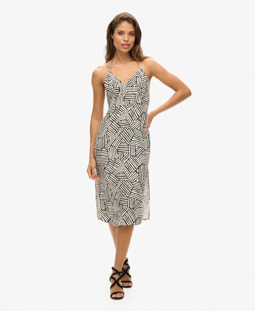 vestido midi estampado em padrão monocromático linear.