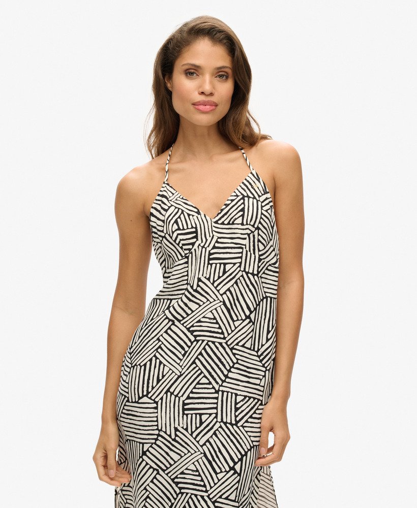vestido midi estampado em padrão monocromático linear.