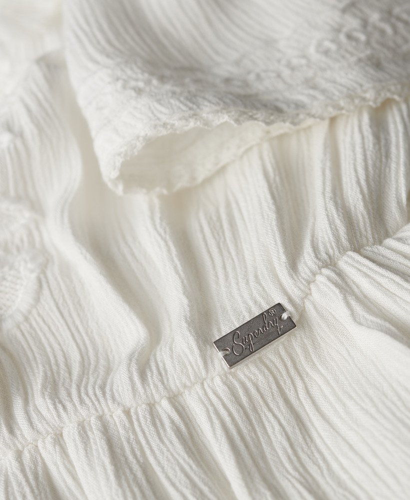 vestido midi bordado em camadas na cor branco off-white.