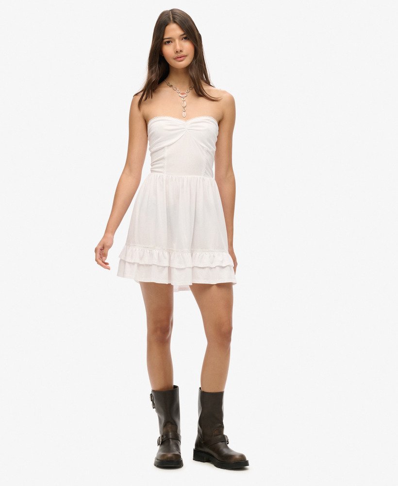 vestido curto bandeau de renda estilo anos 50 na cor óptica.