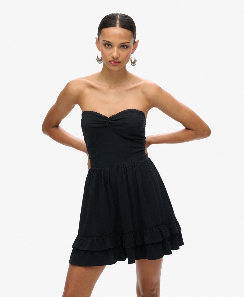 vestido curto bandeau de renda estilo anos 50 na cor preta.