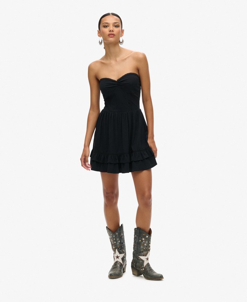 vestido curto bandeau de renda estilo anos 50 na cor preta.