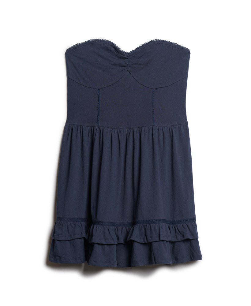 vestido curto bandeau de renda estilo anos 50 em um tom azul marinho intenso.