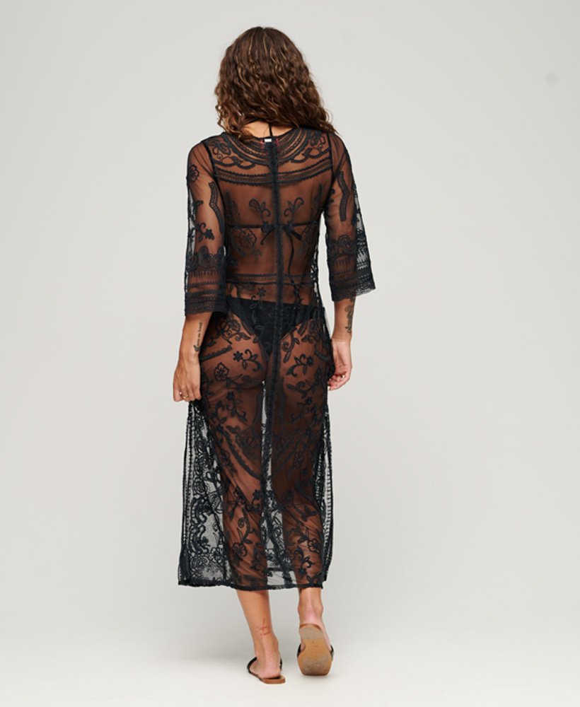 vestido longo de renda para saída de praia na cor preta.