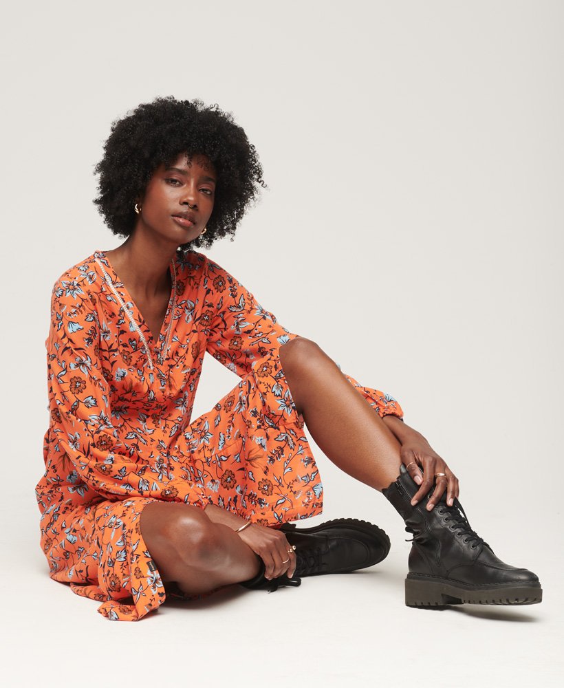 vestido midi estampado com decote em v na cor laranja winterbloom.