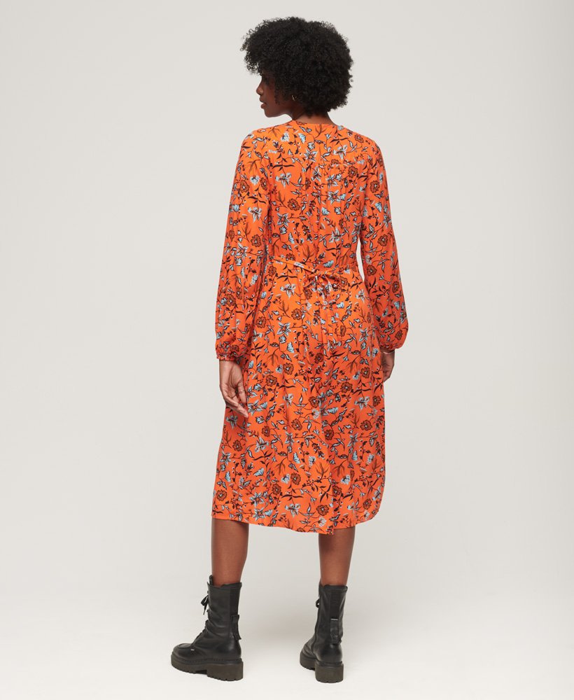 vestido midi estampado com decote em v na cor laranja winterbloom.