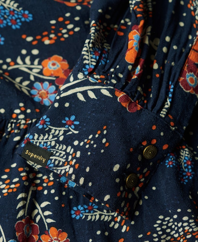 vestido midi de manga comprida com camadas em estampa floral alma azul.