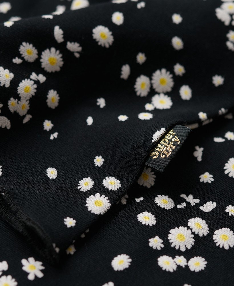 vestido curto de alças estampado em jersey com estampa de margaridas sasha