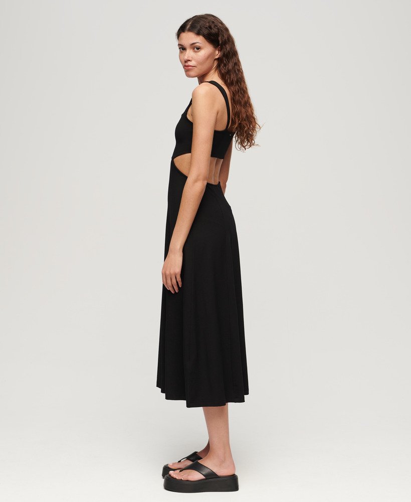 vestido midi de malha com recortes na cor preta.