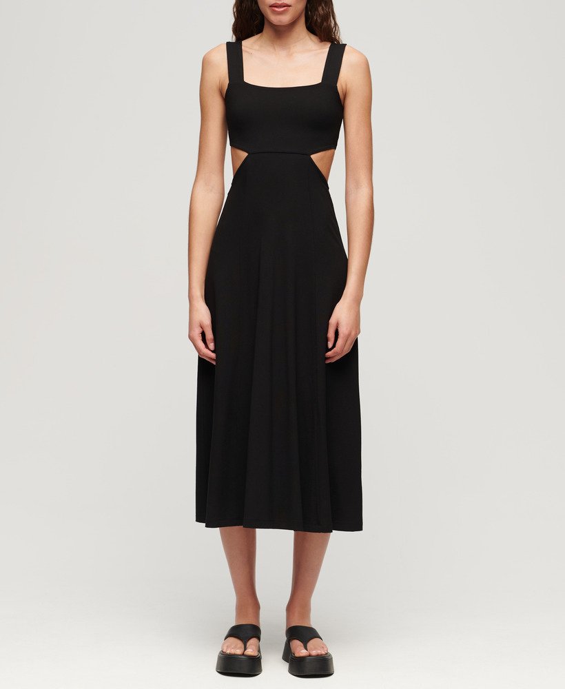 vestido midi de malha com recortes na cor preta.