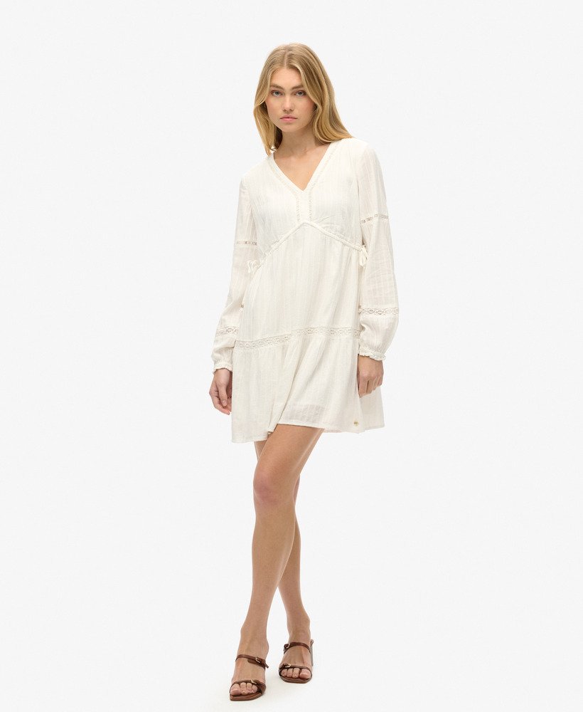 vestido curto ibiza de manga comprida com camadas na cor off white
