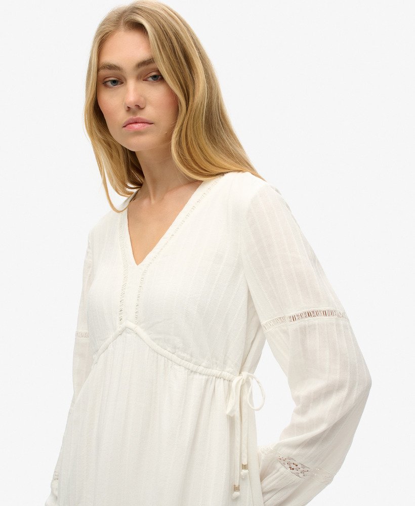 vestido curto ibiza de manga comprida com camadas na cor off white