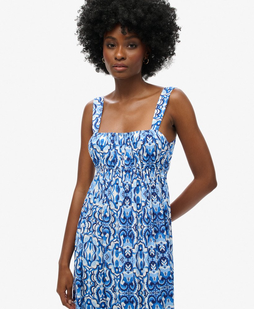vestido longo com amarração nas costas em estampa de azulejos azul