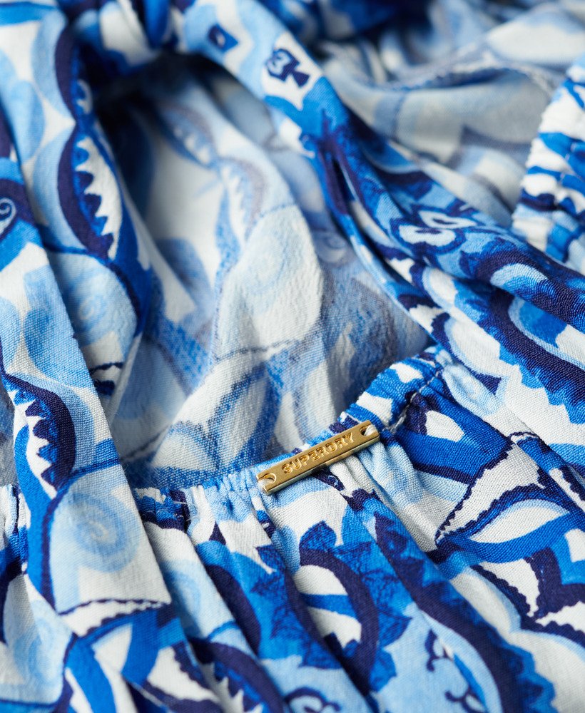 vestido longo com amarração nas costas em estampa de azulejos azul