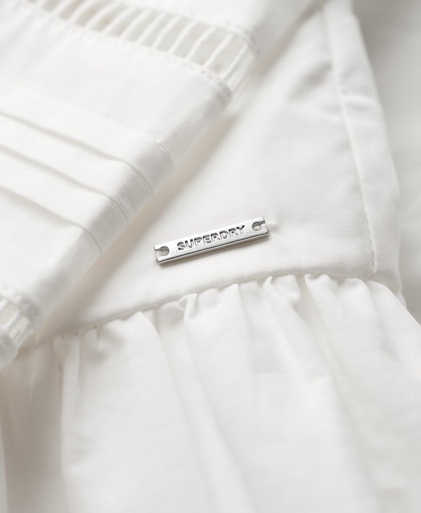 vestido camisa com detalhes em renda na cor branca giz.