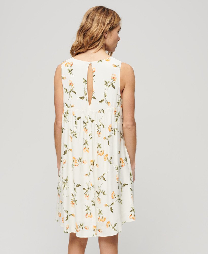 vestido volumoso sem mangas com estampa de rosas cor de pêssego