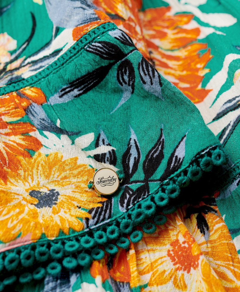 vestido curto de praia estilo camisola na cor azul anêmona de bali.