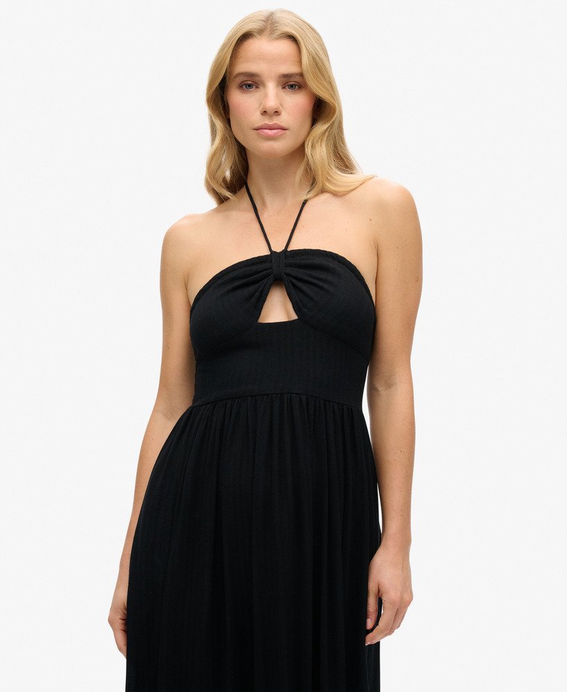 vestido midi com recortes na cor preta.