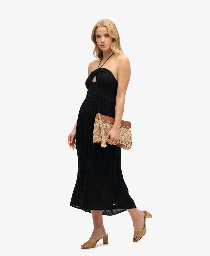 vestido midi com recortes na cor preta.