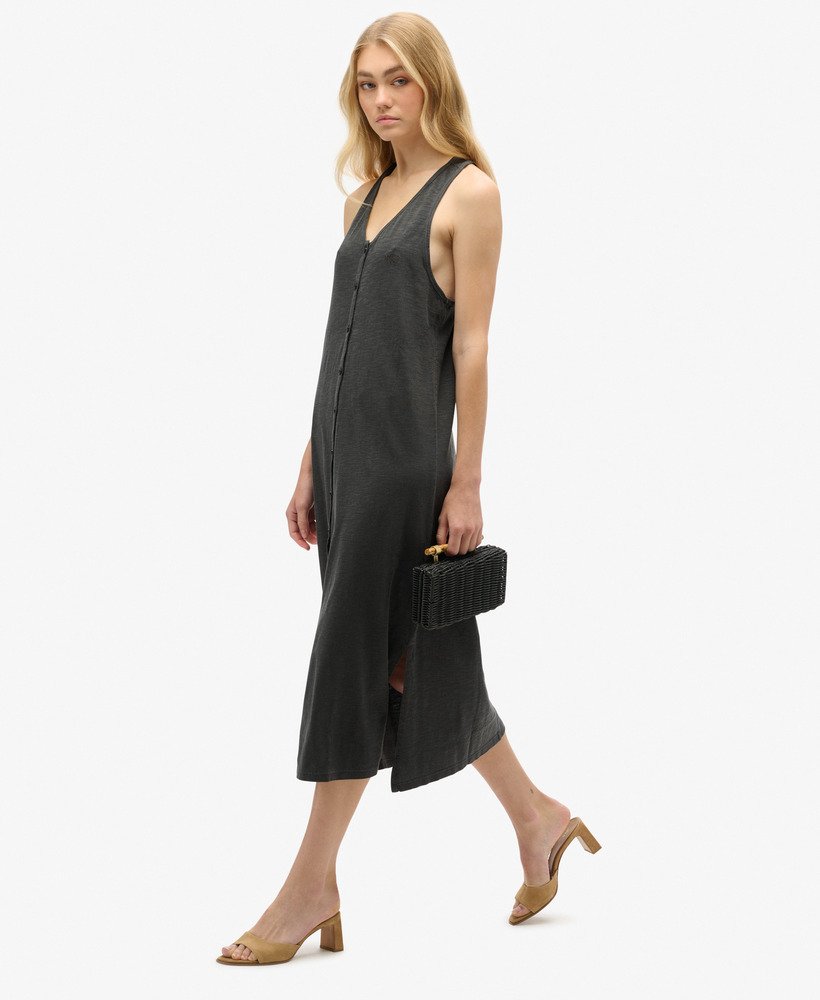 vestido midi de malha jersey estilo colete para praia na cor preta.