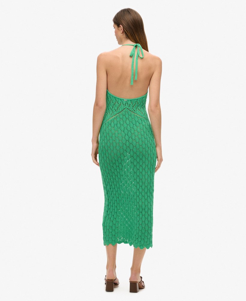 vestido longo de crochê com decote halter na cor verde-kelly.