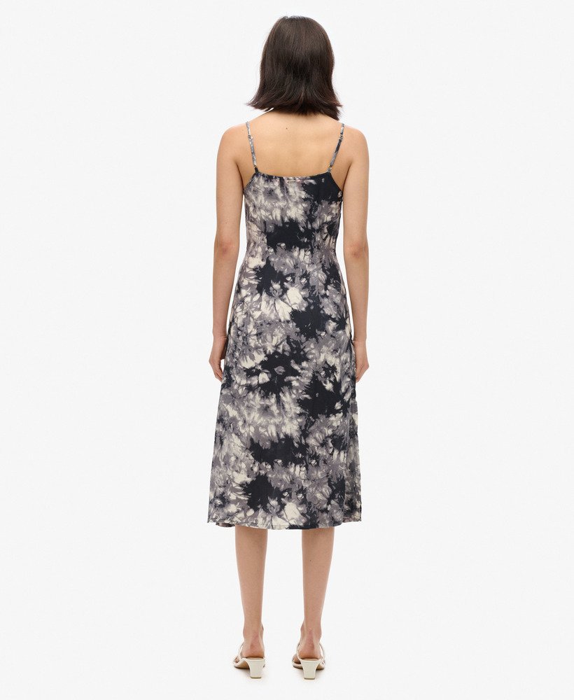 vestido midi de alcinha com botões e estampa grunge tie-dye.