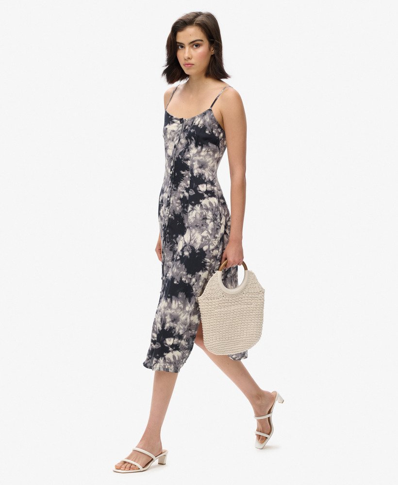 vestido midi de alcinha com botões e estampa grunge tie-dye.