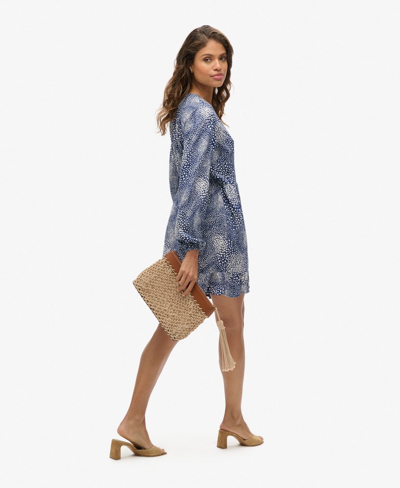 vestido curto envelope de manga comprida com estampa floral miúda azul marinho.
