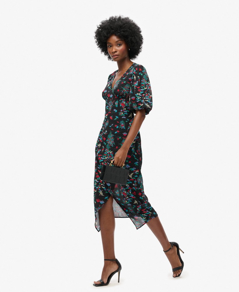 vestido midi transparente de manga curta com estampa de guindastes em preto.