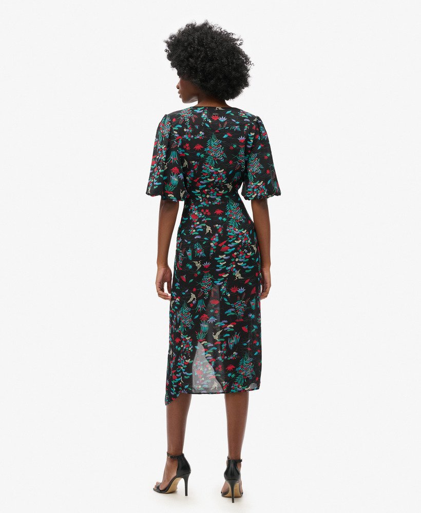 vestido midi transparente de manga curta com estampa de guindastes em preto.