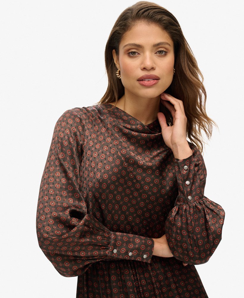 vestido curto com gola drapeada em jacquard na cor laranja com estampa geométrica.