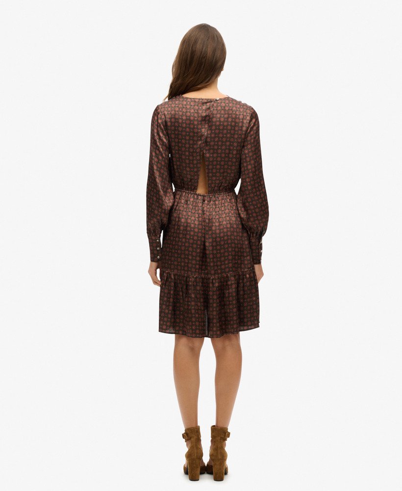 vestido curto com gola drapeada em jacquard na cor laranja com estampa geométrica.