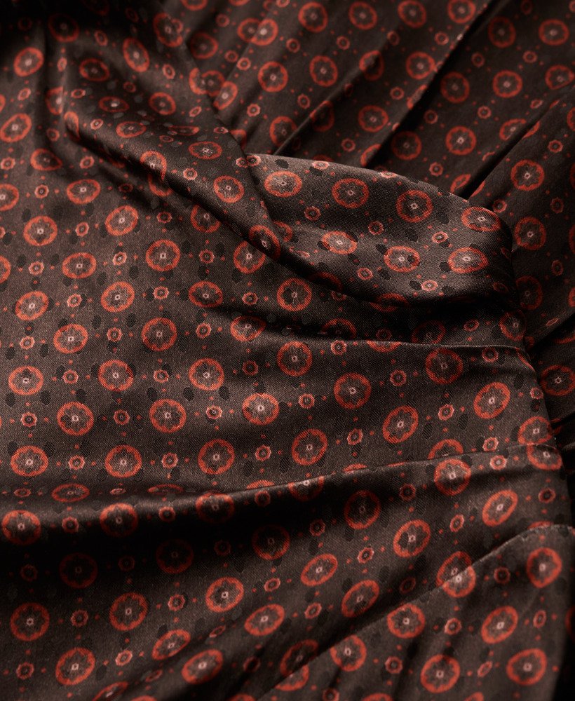 vestido curto com gola drapeada em jacquard na cor laranja com estampa geométrica.
