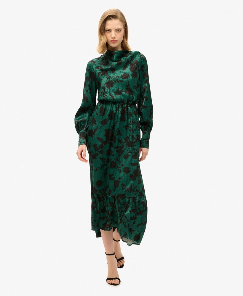 vestido longo jacquard com decote drapeado e estampa floral em tons de azul-petróleo.