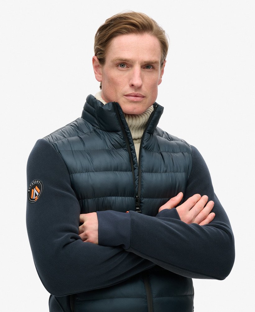 jaqueta bomber híbrida storm fleece na cor azul marinho eclipse