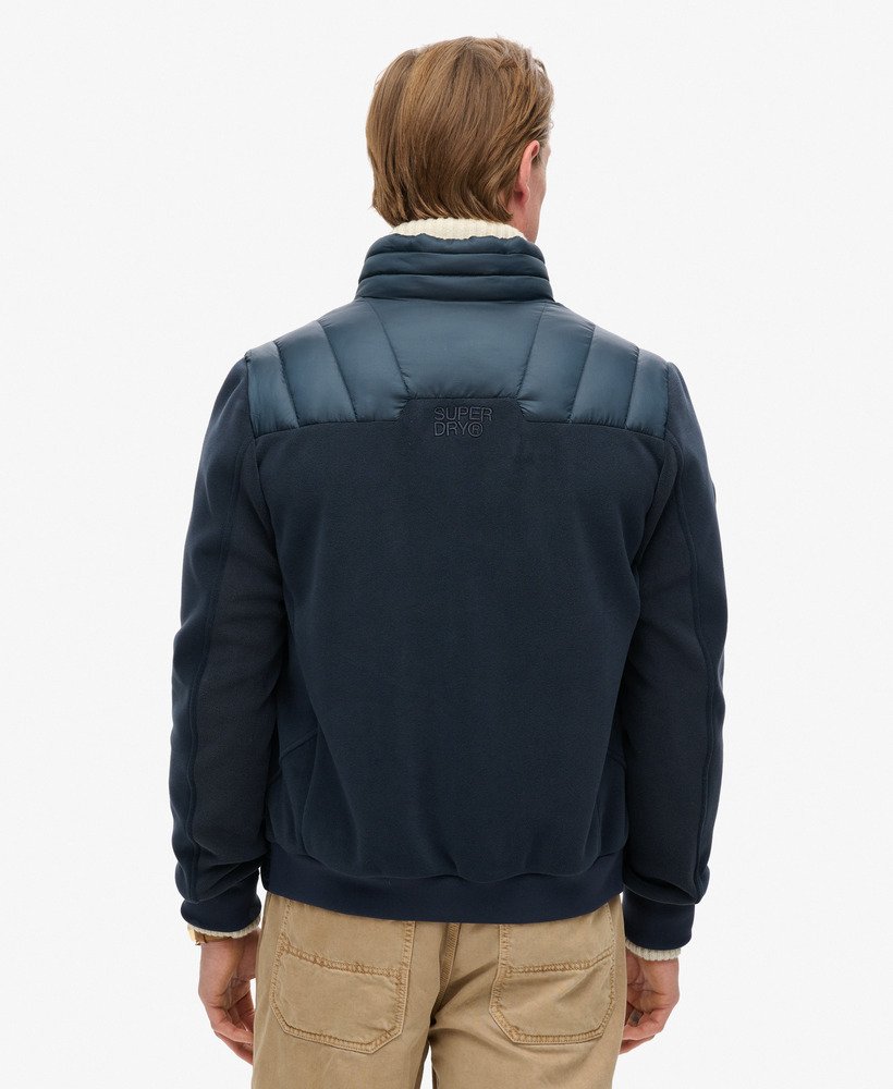 jaqueta bomber híbrida storm fleece na cor azul marinho eclipse