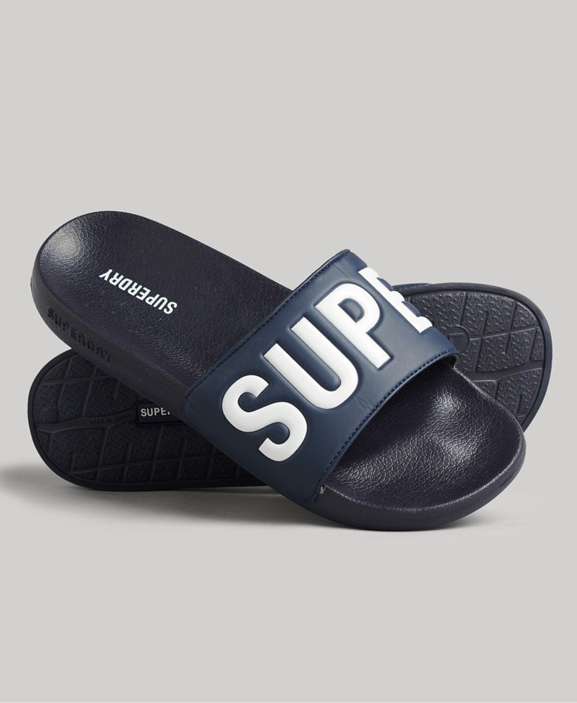 core pool sliders em azul marinho profundoÓptico