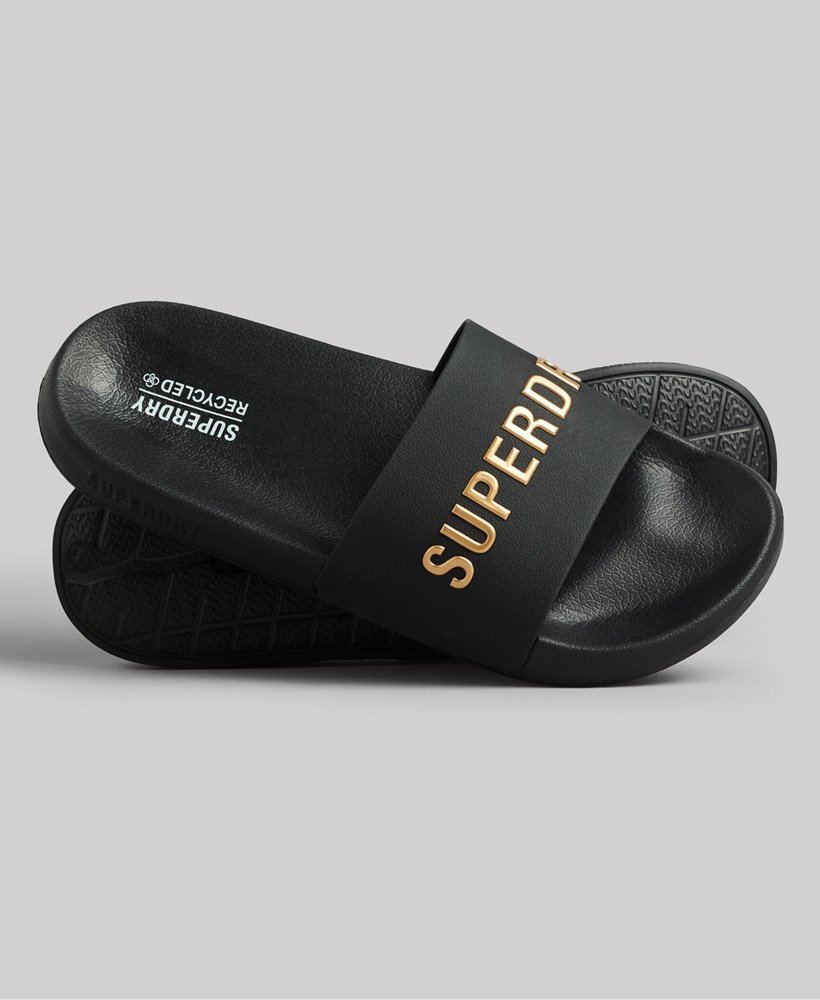 sliders de piscina com o logotipo code em pretodourado metálico