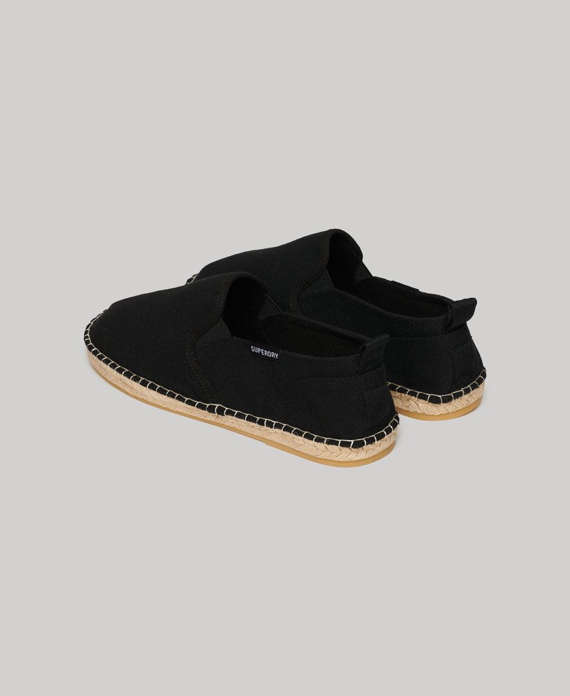 sapatos espadrille de lona na cor preta.
