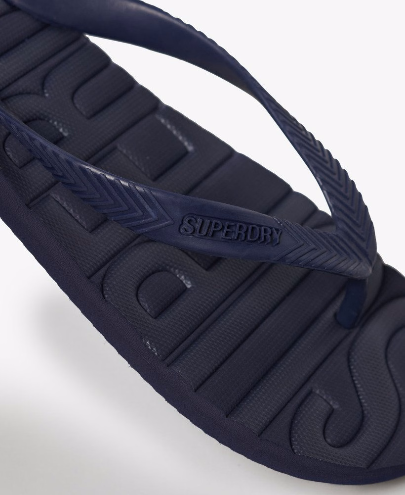 Chinelo com o logotipo principal