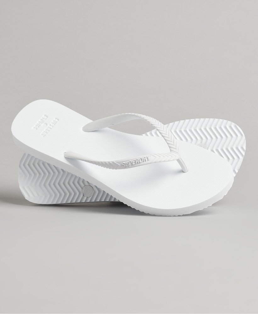 chinelo clássico studios em optic