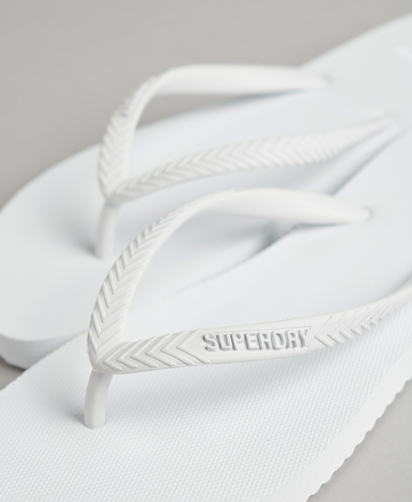 chinelo clássico studios em optic