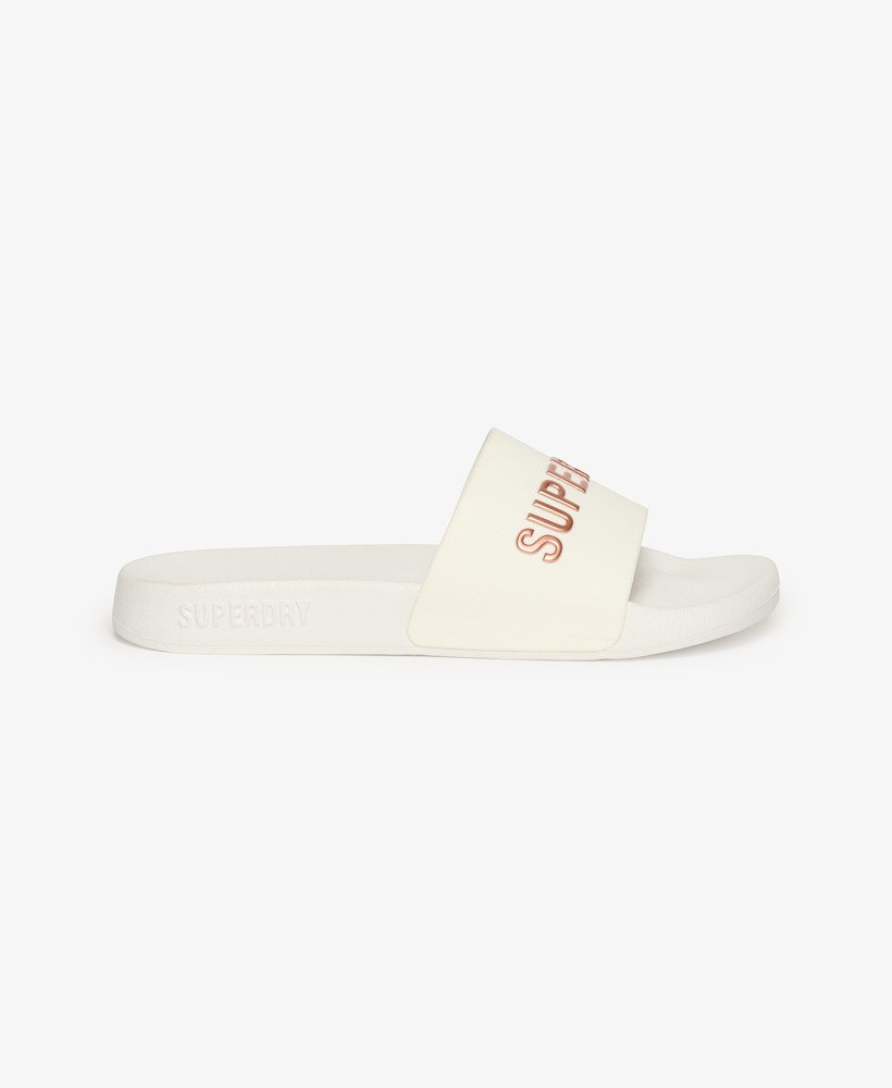 sliders de piscina com o logotipo code em ouro rosa óticometálico