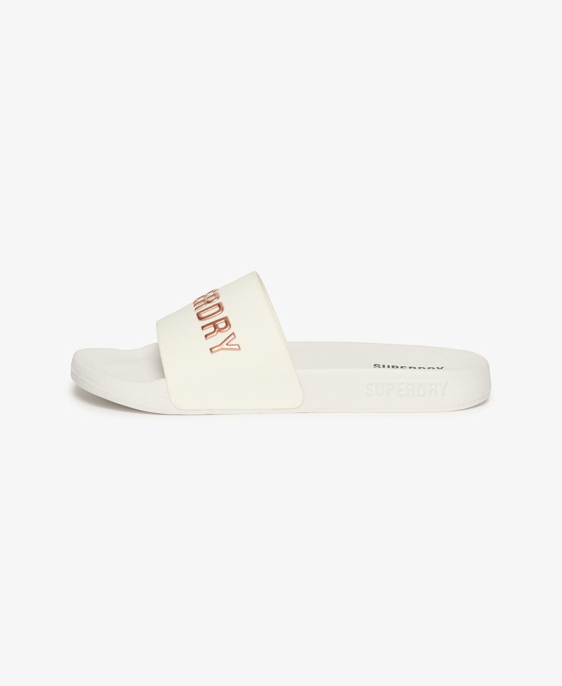 sliders de piscina com o logotipo code em ouro rosa óticometálico