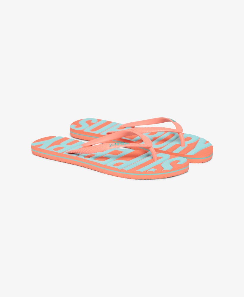chinelo de dedo vegano vintage na cor coral.